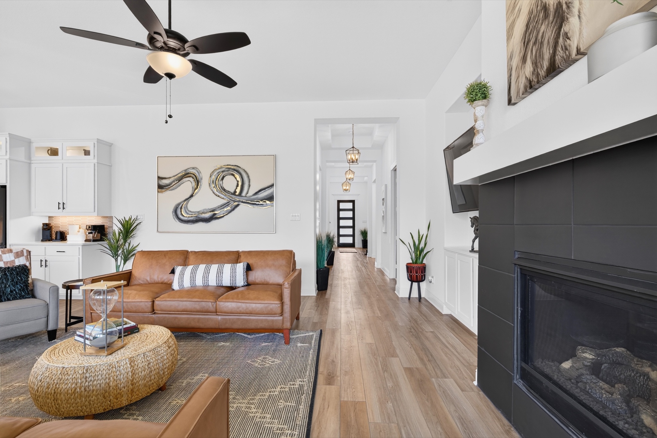 Living room photographed to show its connection to the kitchen